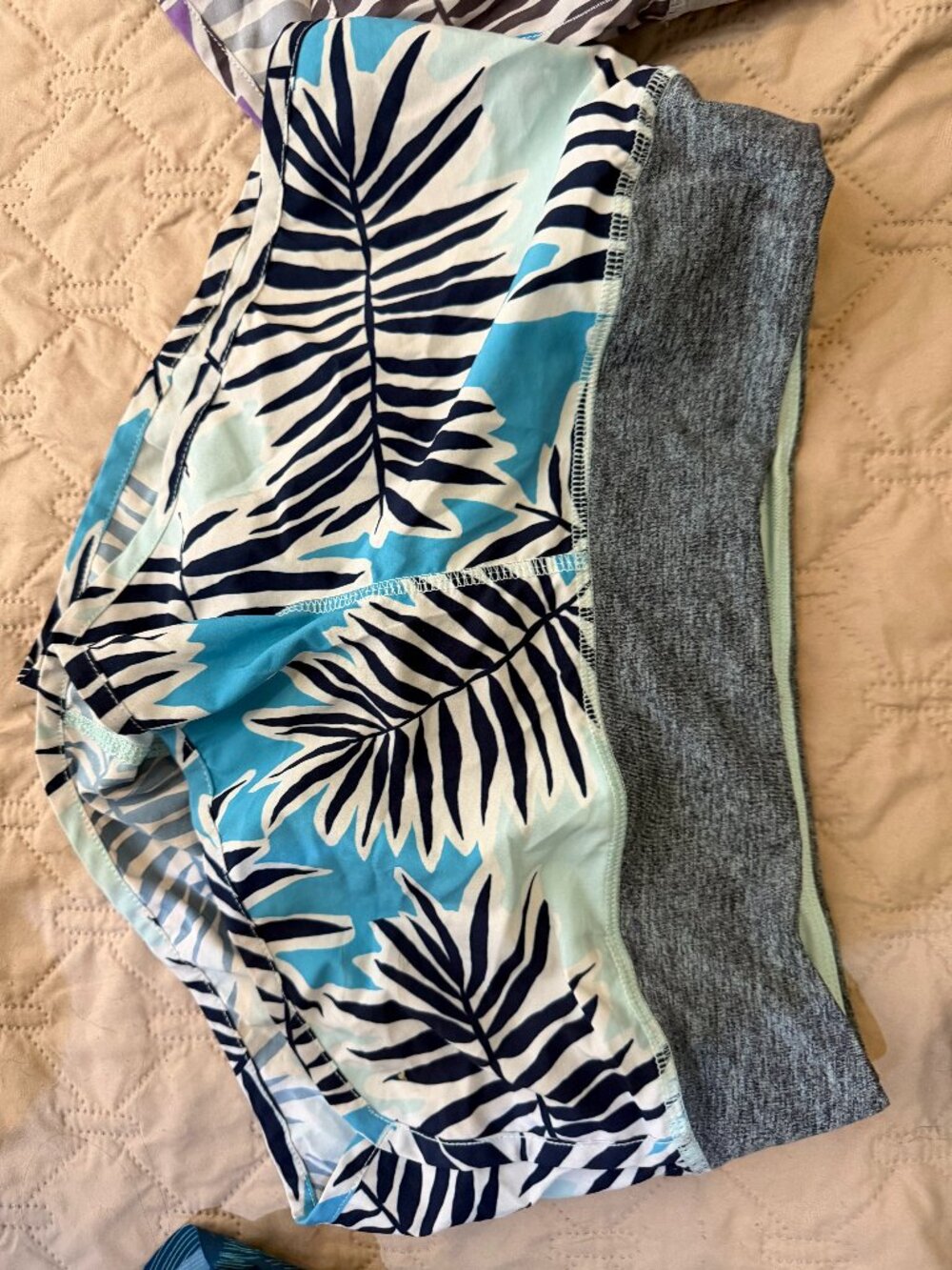 small tropical blue rabbit running shorts